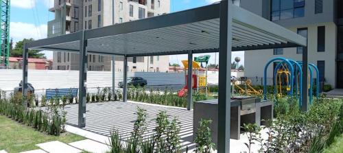 Κήπος έξω από το DEPA Cosmopol acepto roomies