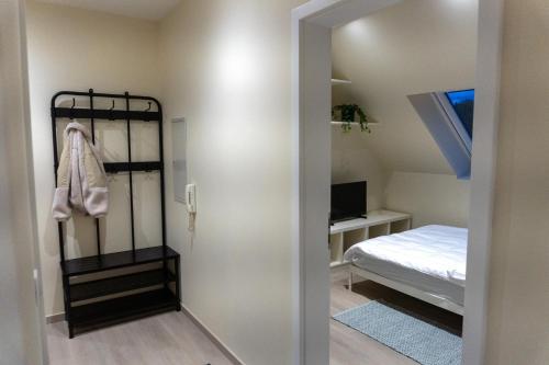 Postel nebo postele na pokoji v ubytování Modernes Apartment für Monteure, Projektteams und Durchreisende