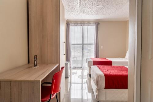 Ένα ή περισσότερα κρεβάτια σε δωμάτιο στο Hotel Veas