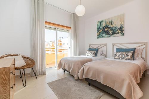 Ένα ή περισσότερα κρεβάτια σε δωμάτιο στο Apartment Lorraine - Duplex, With Pool & Sun Deck