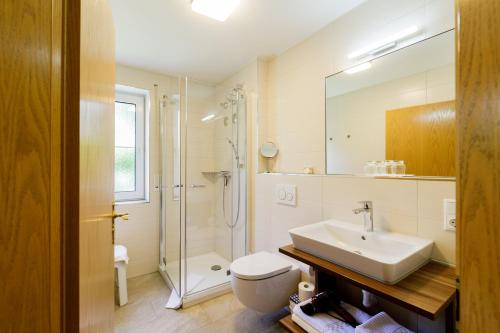 Ένα μπάνιο στο Haus am Mühlenweg - neue, moderne und sonnendurchflutete Appartements