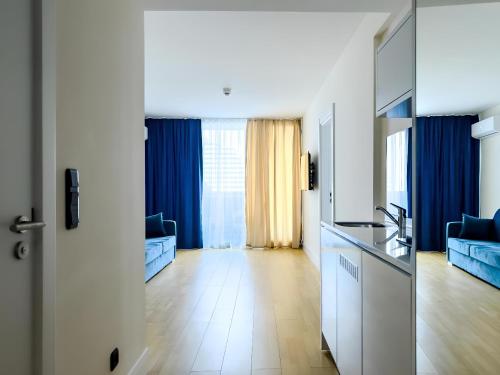 Una cocina o cocineta en Aparthotel In orbi City