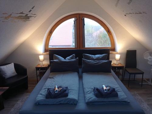 Ένα ή περισσότερα κρεβάτια σε δωμάτιο στο Gästezimmer Öcken