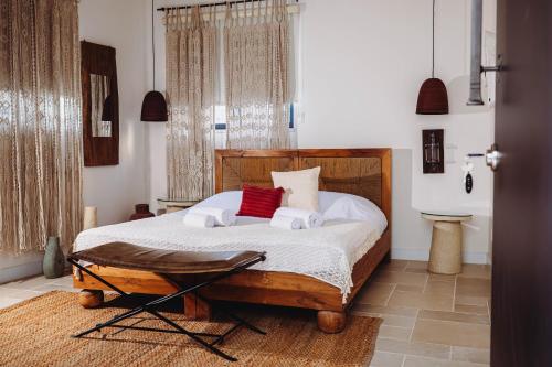 a bedroom with a bed with two towels on it at City of David - Boutique Stay by the Western Wall in Jerusalem