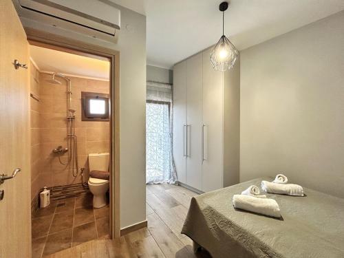 Ένα μπάνιο στο A modern apartment in the village of Venerato