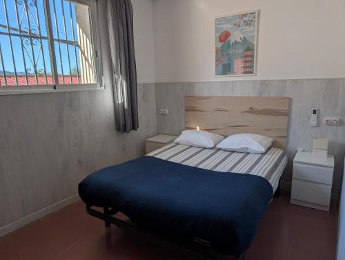 Ένα ή περισσότερα κρεβάτια σε δωμάτιο στο Apartamento Casa Balina