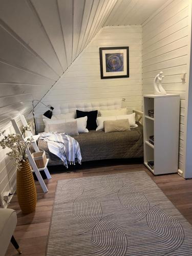 Ένα ή περισσότερα κρεβάτια σε δωμάτιο στο Rønningen Panorama