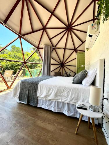 Voodi või voodid majutusasutuse Cabana da Lua - Sua melhor experiência em um domo toas