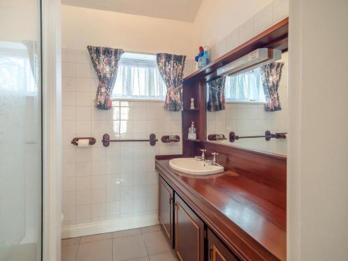 a bathroom with a sink and a mirror at 3 Bed in Bruree oc-i207 in Brú Rí