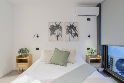 Una cama o camas en una habitación de Riesco Suites by Andes STR