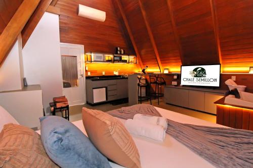 Voodi või voodid majutusasutuse Chalé Semillon toas