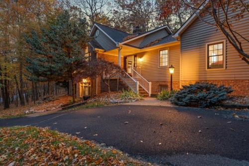 a house with a driveway in front of it at Green Mountain Song-Massanutten Mountain in McGaheysville