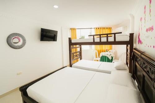 Postel nebo postele na pokoji v ubytování El Velero Apartamentos By DANP