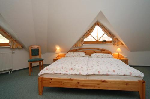 En eller flere senge i et værelse på Ferienpark Freesenbruch Wohnung 13a - Austernfischer