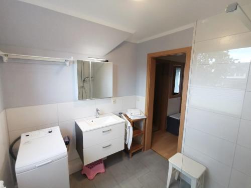 Koupelna v ubytování Karimea