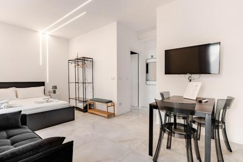 Giường trong phòng chung tại Appt Monolocale Mare & Gaslini Wi-Fi Veloce