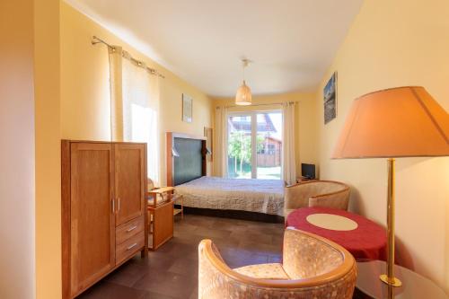 Postel nebo postele na pokoji v ubytování Wuschels Hütt