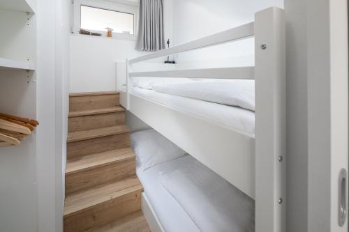 Postel nebo postele na pokoji v ubytování Sonnendeck 14