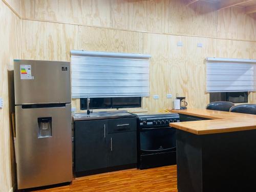 Kuchyň nebo kuchyňský kout v ubytování Cabañas con Tinajas Mahuidas Panguipulli