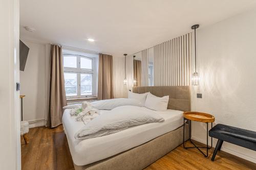 Postel nebo postele na pokoji v ubytování Hotel Seepferdchen Zimmer 3 Eckernförde Self-Check-In