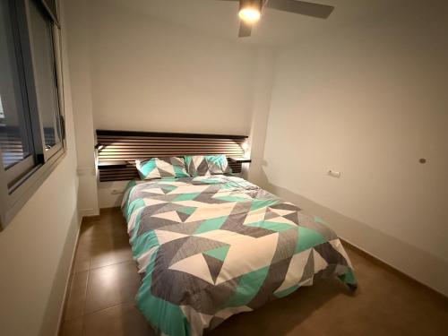 Ένα ή περισσότερα κρεβάτια σε δωμάτιο στο Los Molinos