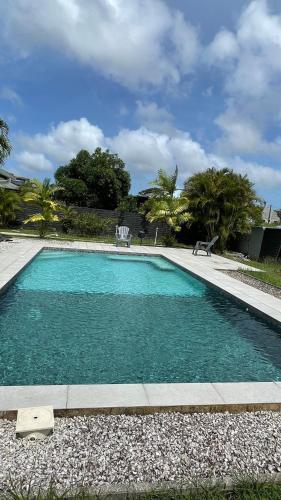 T3 moderne avec piscine partagée proche Family plazza