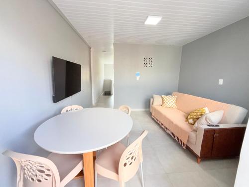 Ένα ή περισσότερα κρεβάτια σε δωμάτιο στο Studio Central Com Ar no centro de Caruaru