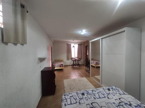 Postel nebo postele na pokoji v ubytování Loft FMIT Medicina