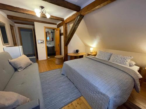 Postel nebo postele na pokoji v ubytování Viesu nams Vijas