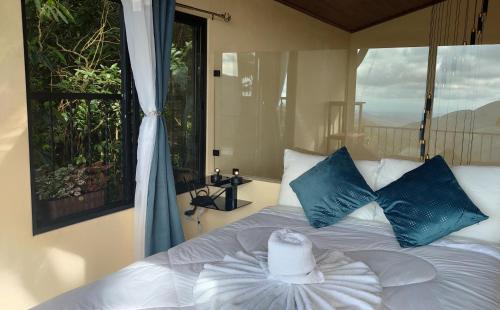 Ένα ή περισσότερα κρεβάτια σε δωμάτιο στο Monteverde Beaumont