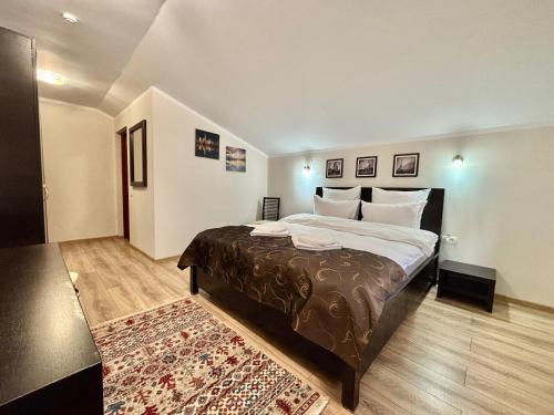 Postel nebo postele na pokoji v ubytování Casa Adrian