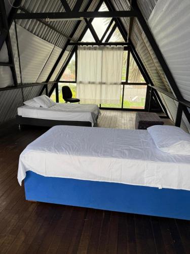 Ένα ή περισσότερα κρεβάτια σε δωμάτιο στο Casa Clara