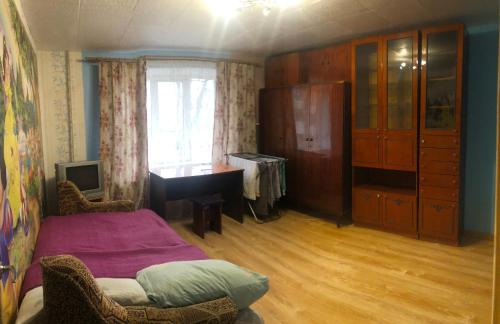 Ένα ή περισσότερα κρεβάτια σε δωμάτιο στο Однокімнатна квартира