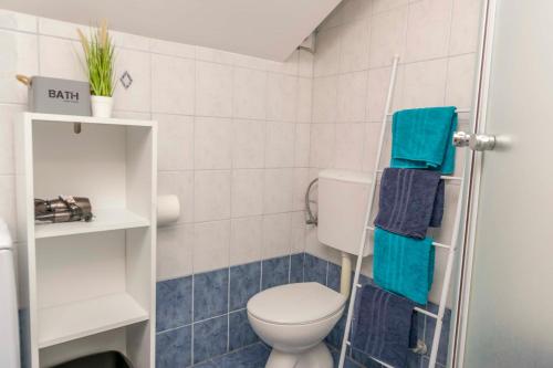 Ένα μπάνιο στο Apartments Beach house Blace