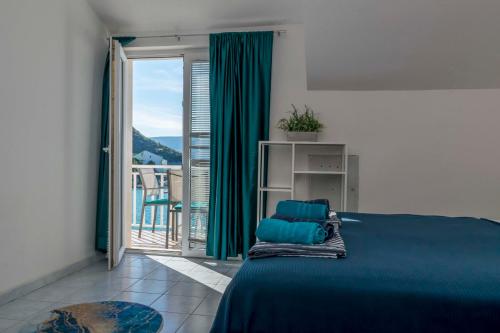 Ένα ή περισσότερα κρεβάτια σε δωμάτιο στο Apartments Beach house Blace