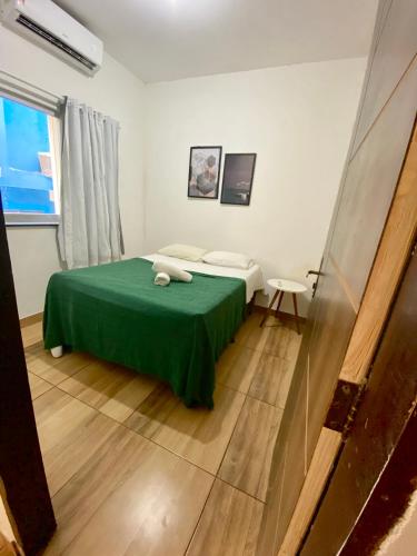 Ένα ή περισσότερα κρεβάτια σε δωμάτιο στο Sua Casa em MSP