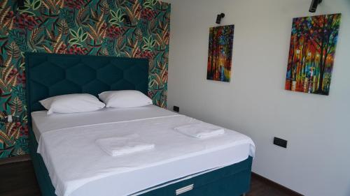 Postel nebo postele na pokoji v ubytování River House Sunrise