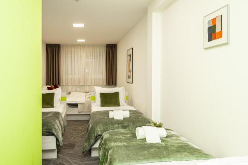 Giường trong phòng chung tại Rooms 136