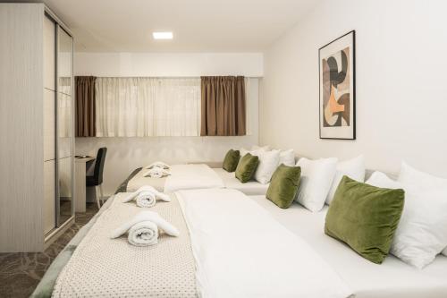 Giường trong phòng chung tại Rooms 136