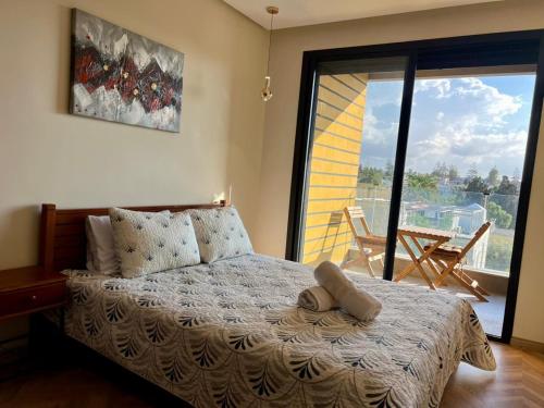 Ένα ή περισσότερα κρεβάτια σε δωμάτιο στο Luxury Appartement Anoual Casablanca city