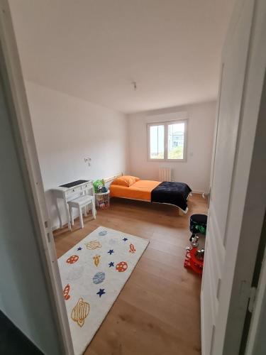 Ένα ή περισσότερα κρεβάτια σε δωμάτιο στο Maison neuve à 20 minde Lille