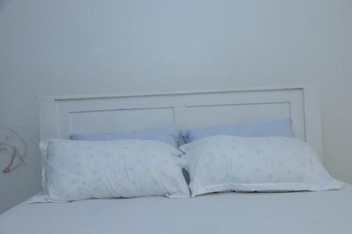 FinchPAR Homes客房内的一张或多张床位