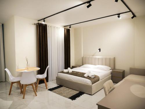 Postel nebo postele na pokoji v ubytování HORIZONT Central Stay Apart-Hotel