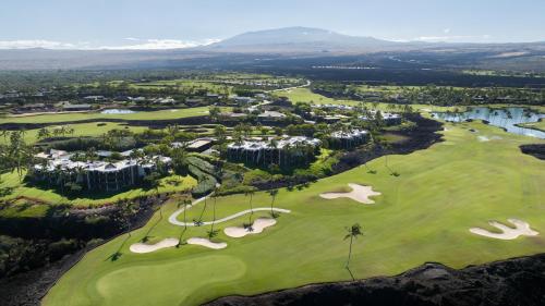 an aerial view of the golf course at the resort at Mauna Lani Point in Waikoloa