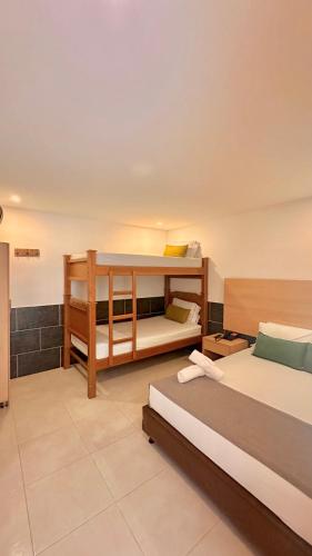 Postel nebo postele na pokoji v ubytování Hotel MOVA