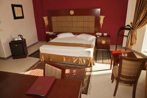 Cama o camas de una habitación en César Palace Sousse