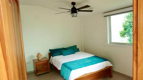 Ένα ή περισσότερα κρεβάτια σε δωμάτιο στο Cristo rey hostal campestre