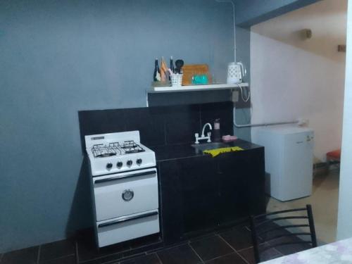 Kuchyň nebo kuchyňský kout v ubytování Glorisa