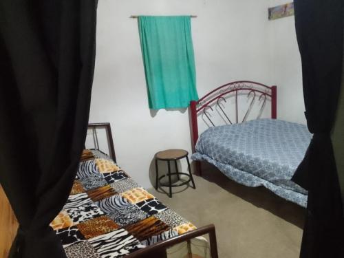 Postel nebo postele na pokoji v ubytování Glorisa