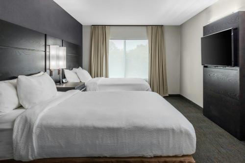 Postel nebo postele na pokoji v ubytování Residence Inn by Marriott Detroit Sterling Heights